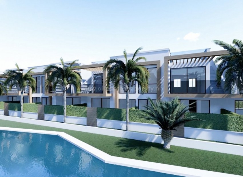 40 bungalow/rekkehus Pau 26 i Orihuela Costa, 2 og 3 soverom, privat hage i første etasje, privat solarium. Direkte tilgang til felles basseng