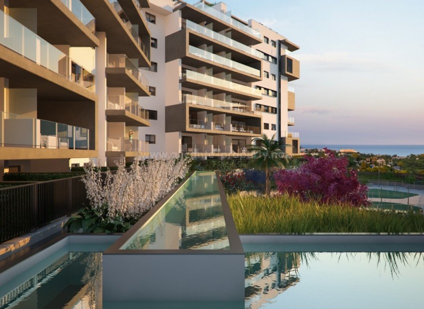 Luxury apartments by the sea and La Glea beach in Campoamor, 3 bedrooms, 2 bathrooms, heated indoor pool, large terrace and nice shared garden.