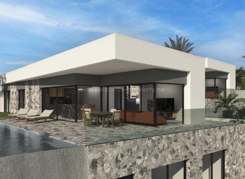 New luxury villas in Finestrat near Benidorm, 4 bedrooms, 5 bathrooms, semi-basement, terrace with swimming pool and fantastic views of Benidorm, double garage