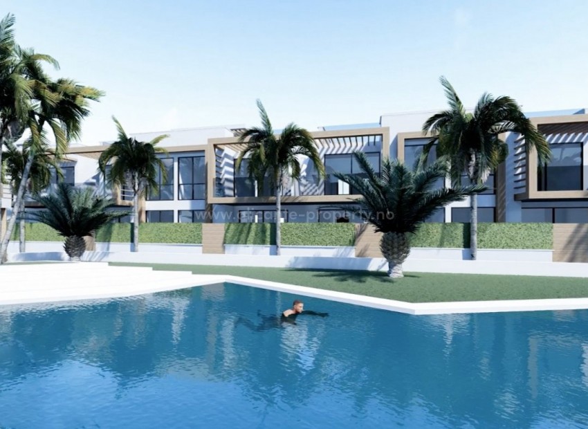 Nybygget boligkompleks i Orihuela Costa, 2 og 3 soverom, basseng, solarium, hage. Ligger ved siden av stranden i Punta Prima.Parkering og bod.