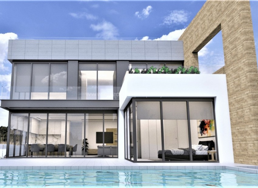 Nybygget luksus-villa nær La Zenia Beach med 4 soverom, 6 bad og havutsikt, 2 terrasser, solarium, kjeller, privat basseng og parkeringsplass.