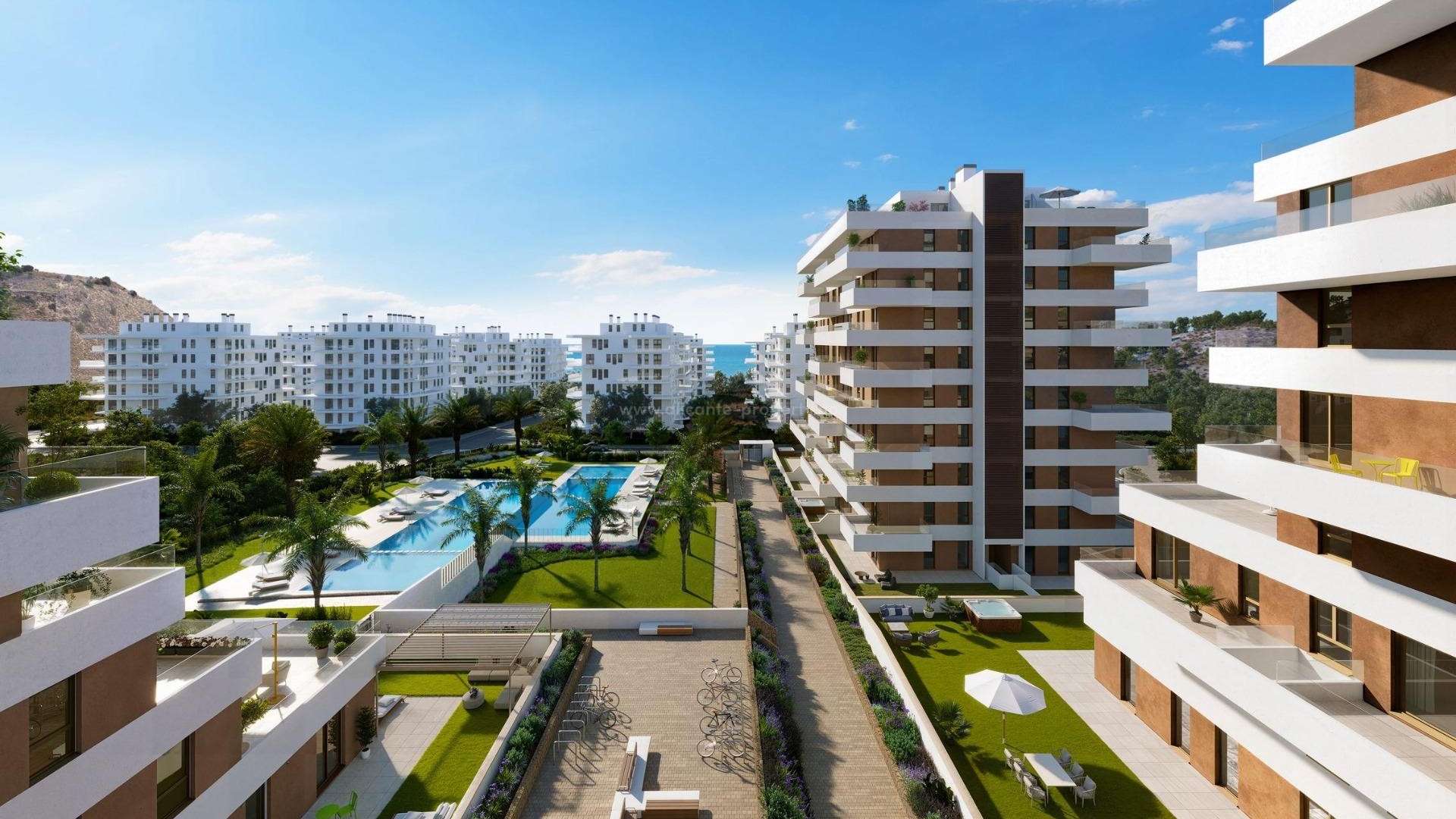Nye leiligheter i Villajoyosa bare 450 meter fra strand, 2/3 soverom, 2 bad, svømmebasseng, treningsstudio, stor terrasse. 1 etasje med privat hage.