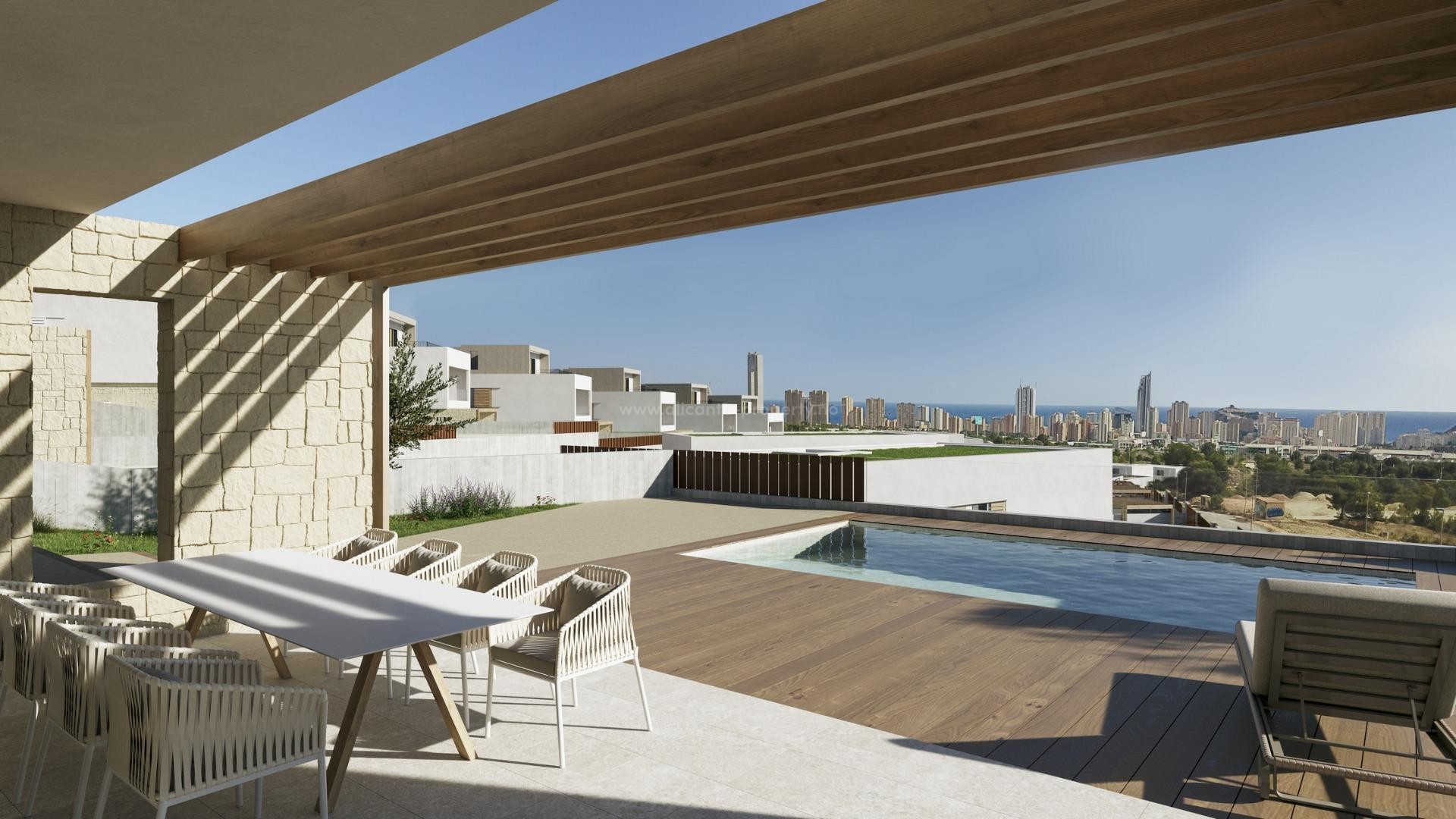 Villaer med 4 soverom og 4 bad i Finestrat, privat hage med basseng med fantastisk utsikt over Benidorm. Ligger i Marina Baixa-regionen på Costa Blanca