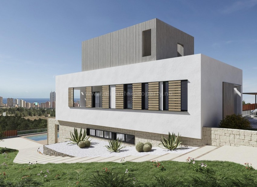 Villas with 4 bedrooms and 4 bathrooms in Finestrat, private garden with pool with fantastic views over Benidorm. Located in the Marina Baixa region of the Costa Blanca