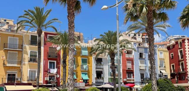 Colorful houses and apartments in Villajoyosa give the coastal town a creative living environment.